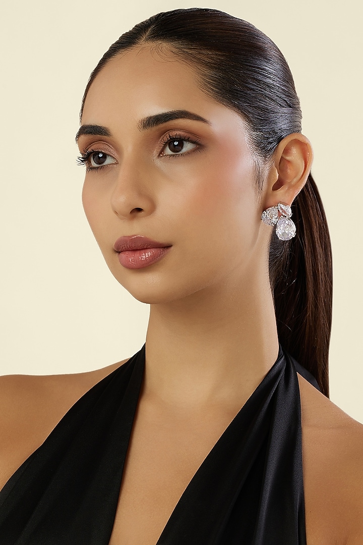 White Rhodium Finish Diamante Stud Earrings by Isharya at Pernia's Pop Up Shop