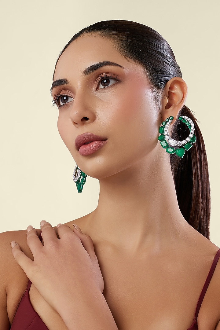 White Rhodium Finish Diamante & Emerald Green Gemstone Dangler Earrings by Isharya at Pernia's Pop Up Shop