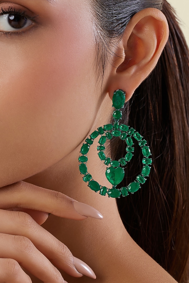 Green Finish Emerald Gemstone Dangler Earrings by Isharya at Pernia's Pop Up Shop