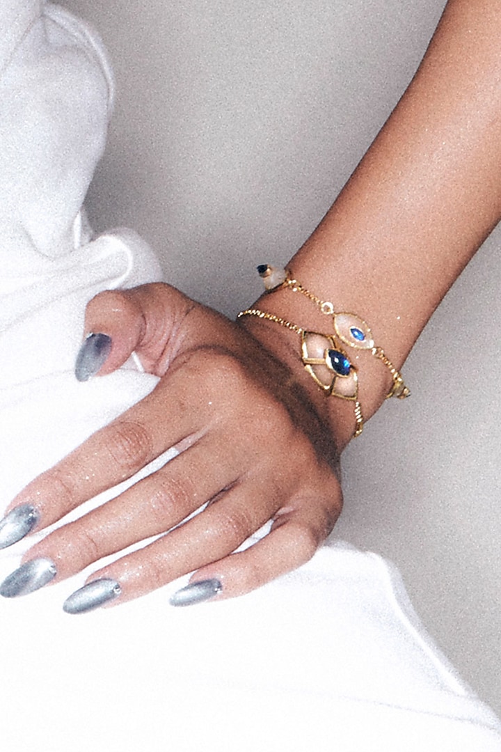 Gold Finish Blue Sapphire Stone Evil Eye Bracelet by Isharya
