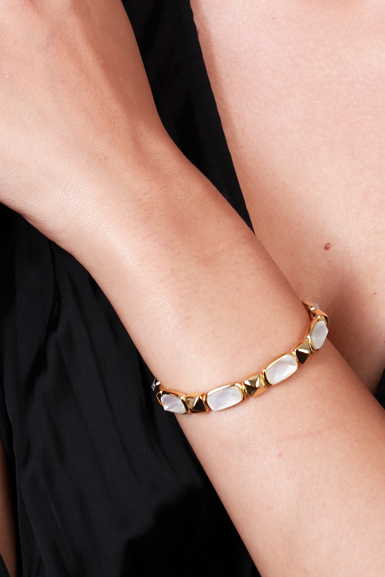 Gold Finish Mother Of Pearl Bracelet by Isharya at Pernia's Pop Up Shop