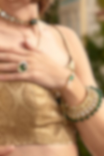 Gold Finish Green Hydro Stone Cuff by Isharya at Pernia's Pop Up Shop