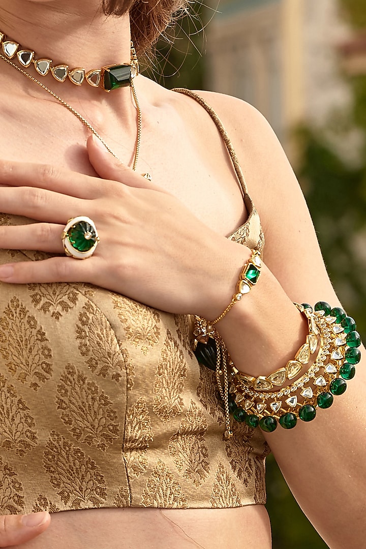 Gold Finish Green Hydro Stone Cuff by Isharya at Pernia's Pop Up Shop