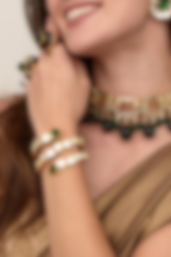 Gold Finish Green Hydro Stone Cuff by Isharya at Pernia's Pop Up Shop