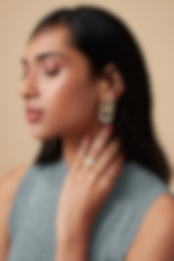 Gold Finish Infinity Stud Earrings by Isharya at Pernia's Pop Up Shop