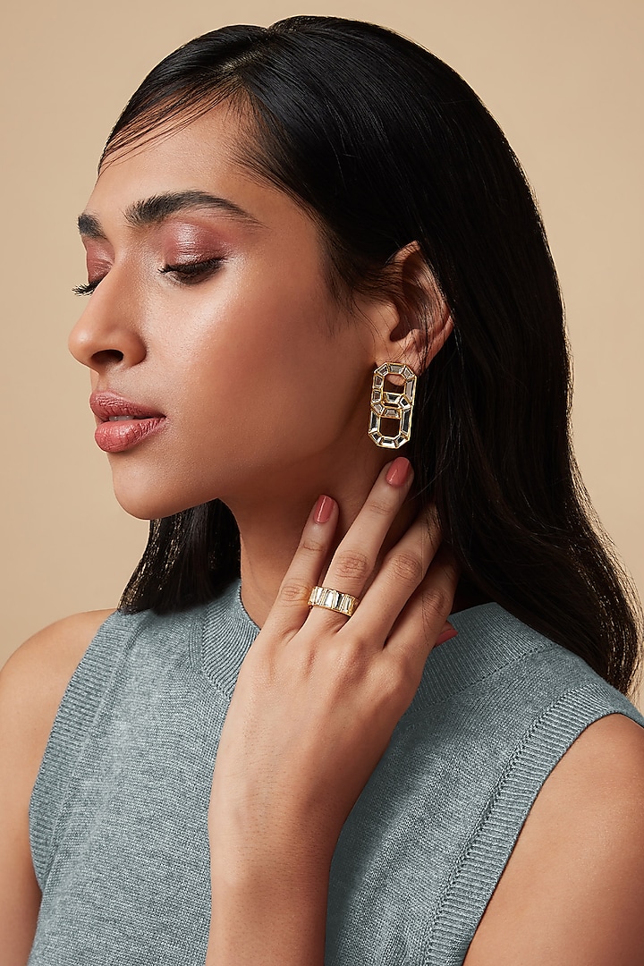 Gold Finish Infinity Stud Earrings by Isharya
