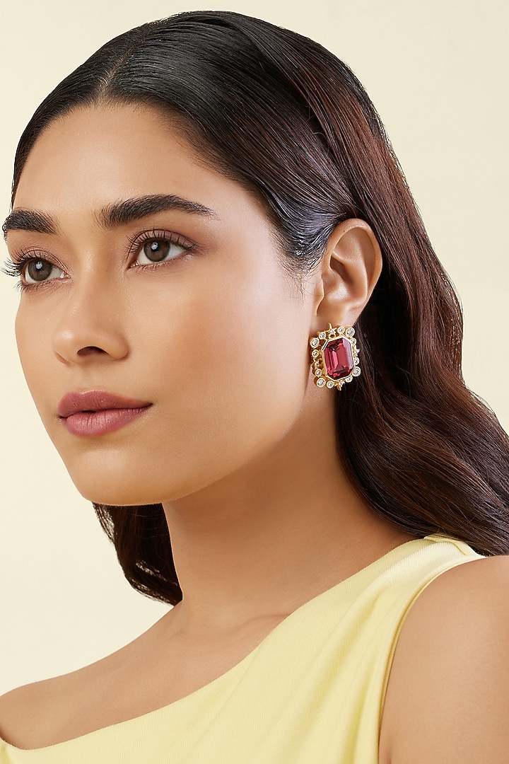 Gold Plated Red Crystal Zirconia Stone Stud Earrings by Isharya at Pernia's Pop Up Shop