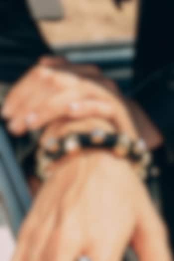 Gold Finish Resin Bangle by Isharya at Pernia's Pop Up Shop