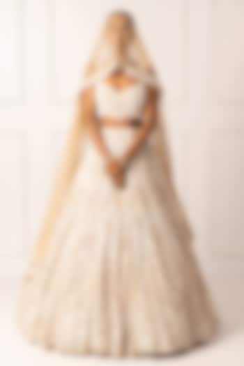 Beige Satin & Net Pearl Embroidered Bridal Lehenga Set by Isha Regalia at Pernia's Pop Up Shop