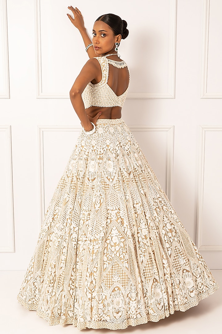Beige Satin & Net Pearl Embroidered Bridal Lehenga Set by Isha Regalia at Pernia's Pop Up Shop