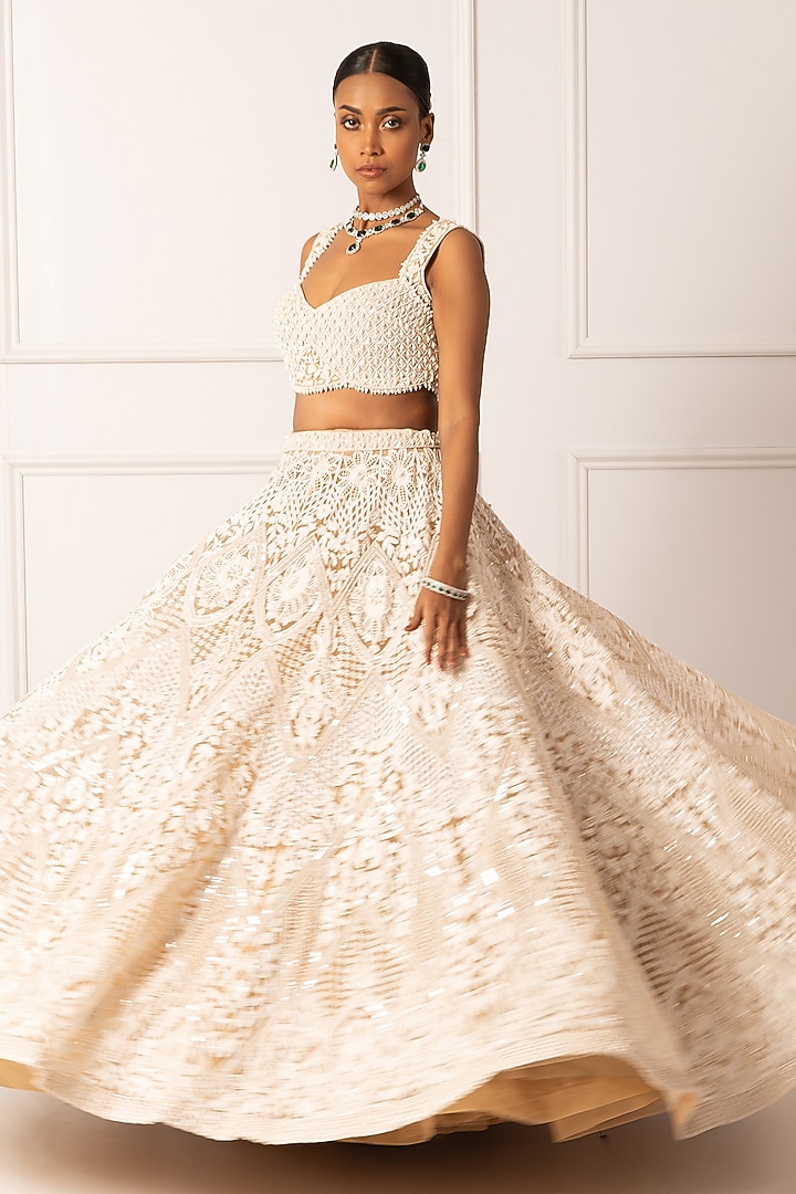 Beige Satin & Net Pearl Embroidered Bridal Lehenga Set by Isha Regalia at Pernia's Pop Up Shop