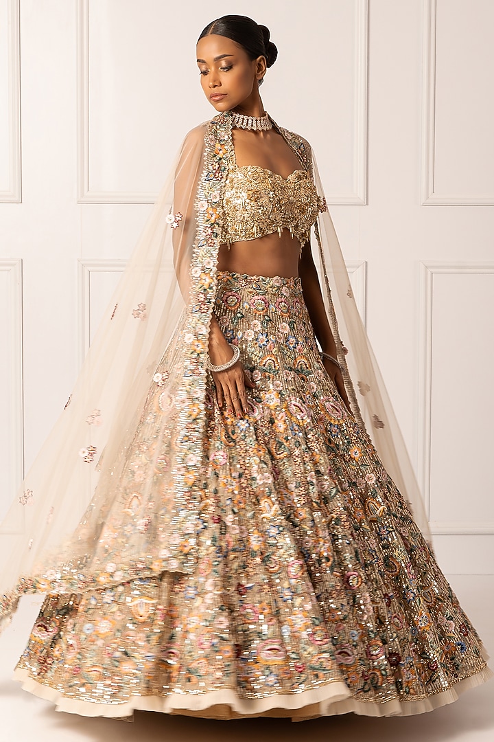Beige Satin Floral & Sequin Embroidered Bridal Lehenga Set by Isha Regalia at Pernia's Pop Up Shop