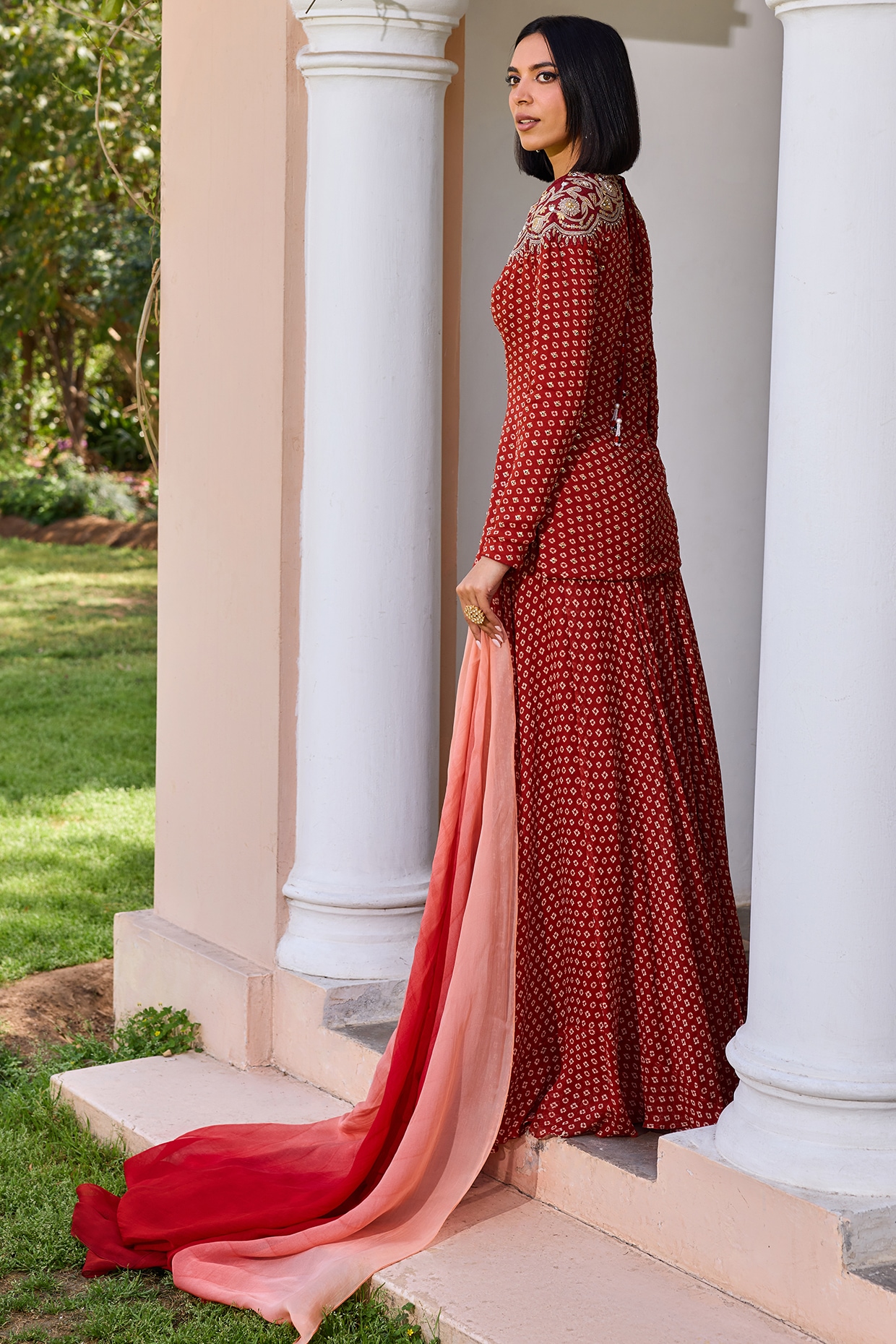 Red Georgette Bandhani Sharara Set by Isha Gupta Tayal at Pernia's