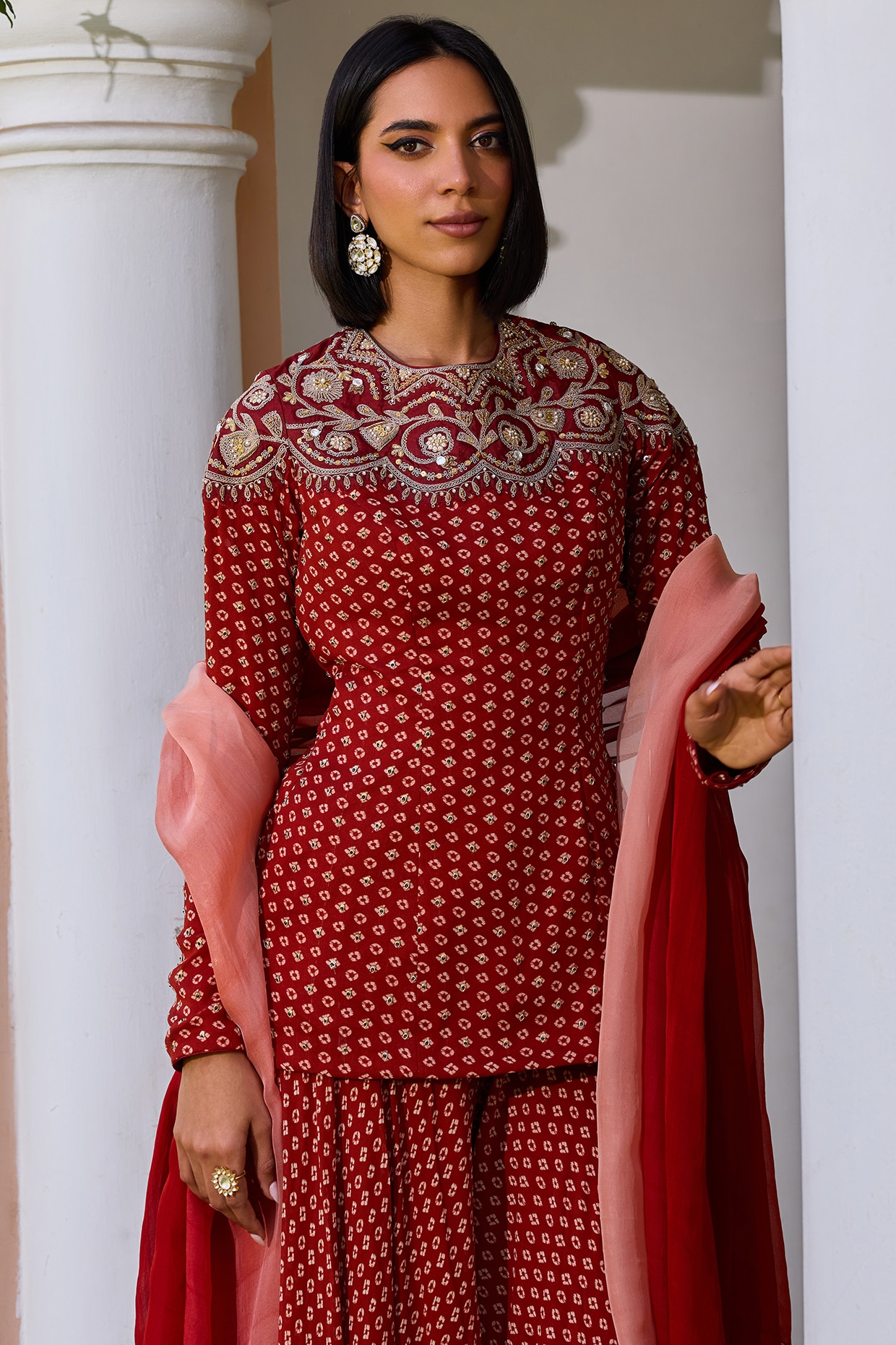 Red Georgette Bandhani Sharara Set by Isha Gupta Tayal at Pernia's