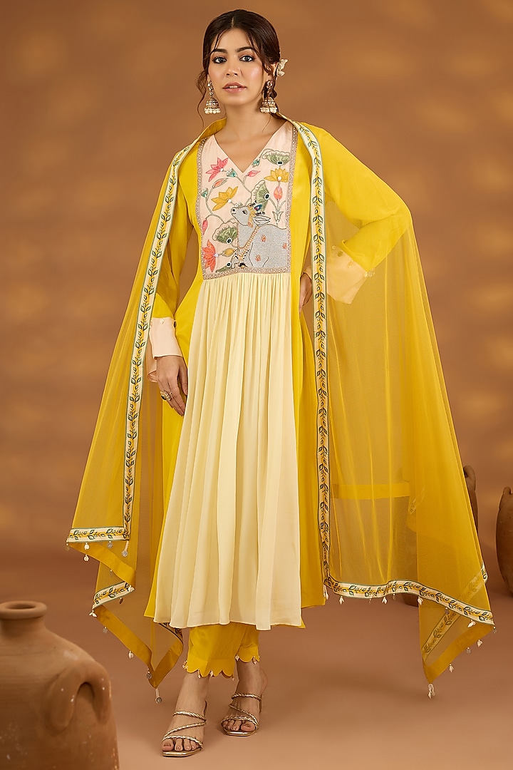 Yellow Crepe Dori Embroidered Color-Blocked Kurta Set by Isha Gupta Tayal at Pernia's Pop Up Shop