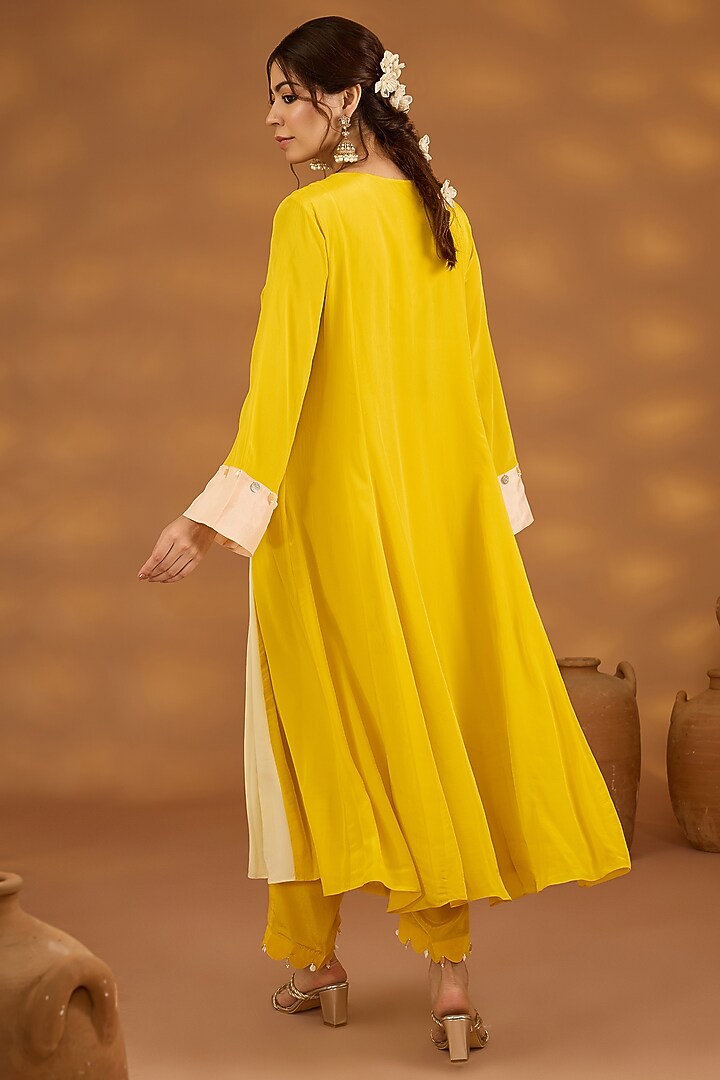 Yellow Crepe Dori Embroidered Color-Blocked Kurta Set by Isha Gupta Tayal at Pernia's Pop Up Shop