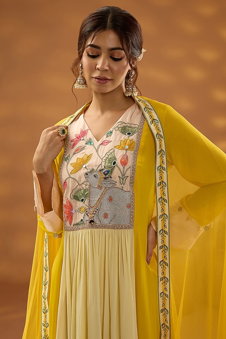 Yellow Crepe Dori Embroidered Color-Blocked Kurta Set by Isha Gupta Tayal at Pernia's Pop Up Shop