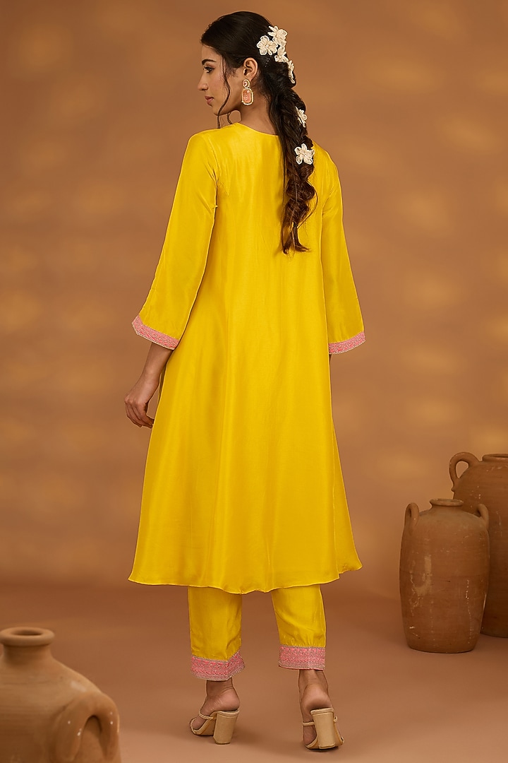 Yellow Silk Hand Embroidered Flowy Kurta Set by Isha Gupta Tayal at Pernia's Pop Up Shop