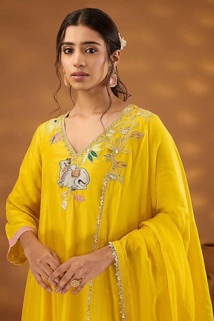 Yellow Silk Hand Embroidered Flowy Kurta Set by Isha Gupta Tayal at Pernia's Pop Up Shop