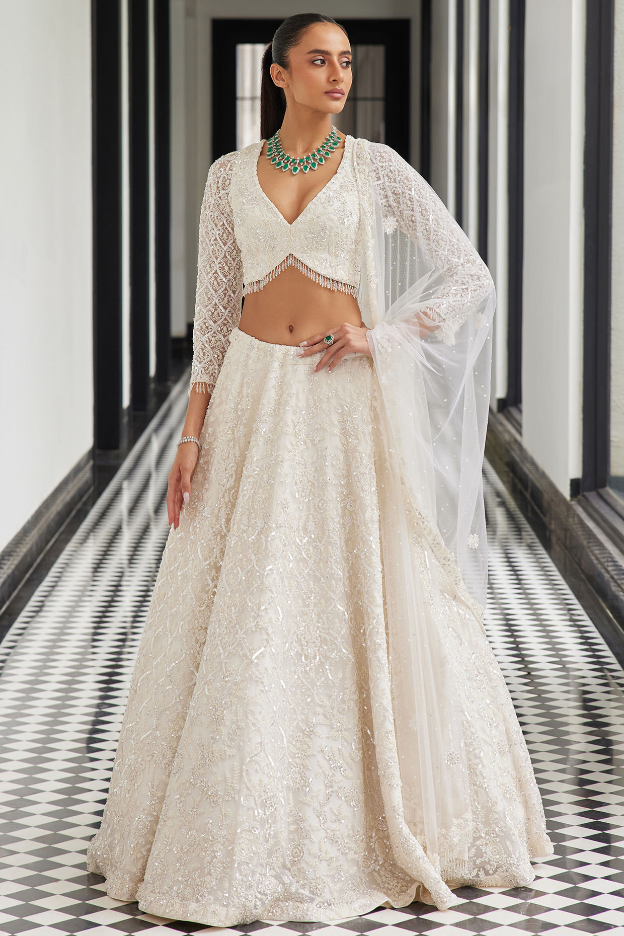 Ivory Net Hand Embroidered Bridal Lehenga Set by ISTYA at Pernia's Pop Up Shop