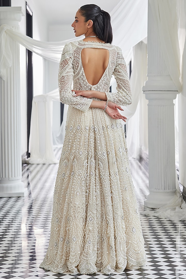 Ivory Net Pearl Embellished Jacket Bridal Gown With Skirt by ISTYA at Pernia's Pop Up Shop