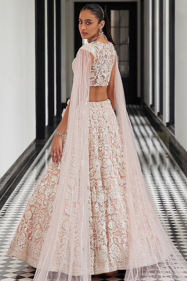 Pink Net Sequins Embroidered Bridal Lehenga Set by ISTYA at Pernia's Pop Up Shop