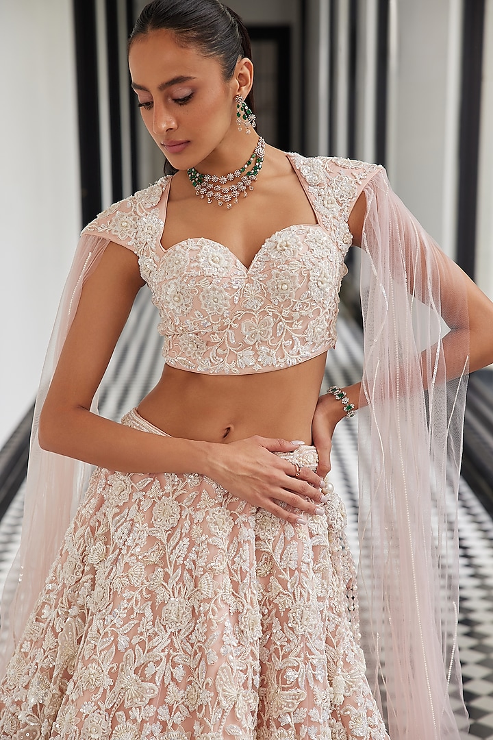 Pink Net Sequins Embroidered Bridal Lehenga Set by ISTYA at Pernia's Pop Up Shop