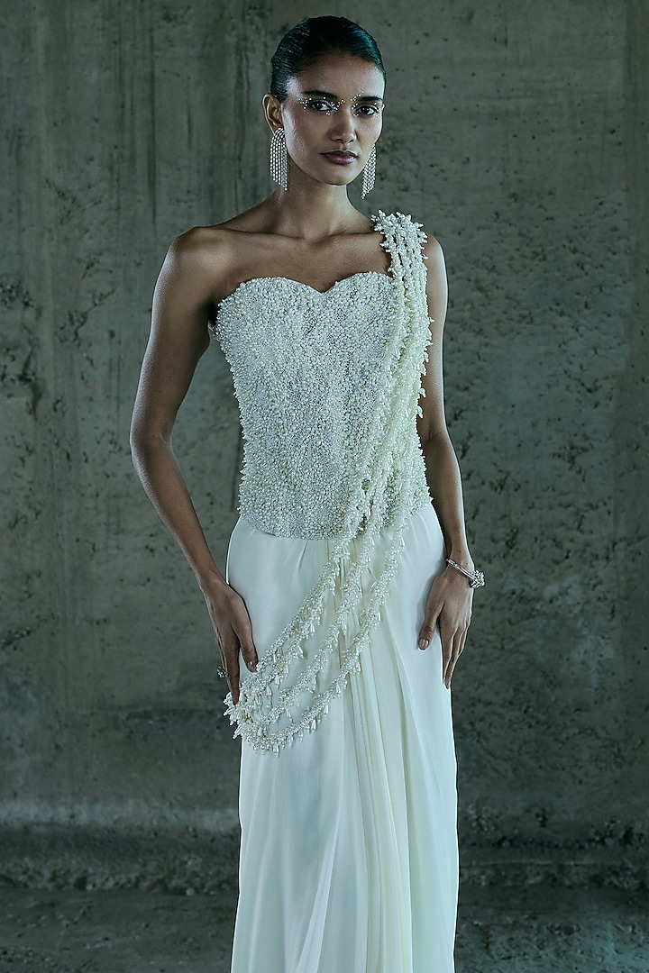 Ivory Georgette Pearl Hand Embroidered Draped Reception Saree Set by ISTYA at Pernia's Pop Up Shop