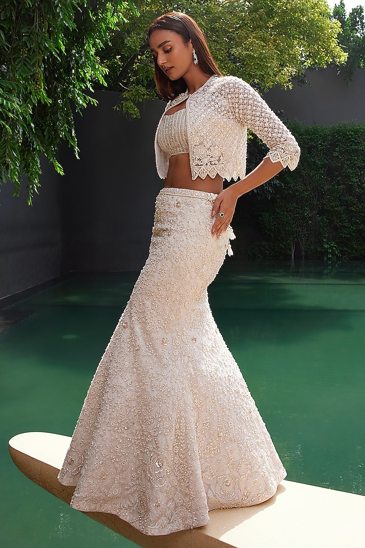 Ivory Net Sequin & Pearl Embellished Fish-Cut Wedding Lehenga Set by ISTYA at Pernia's Pop Up Shop