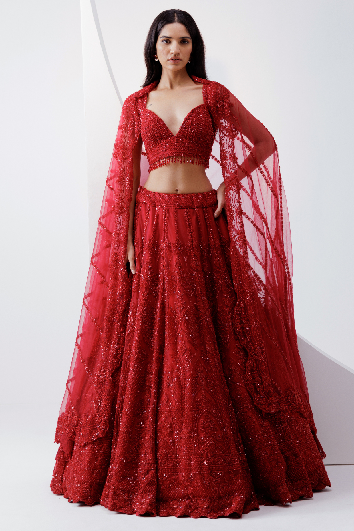 Red Net Bead & Cutdana Embroidered Bridal Lehenga Set by ISTYA at Pernia's Pop Up Shop