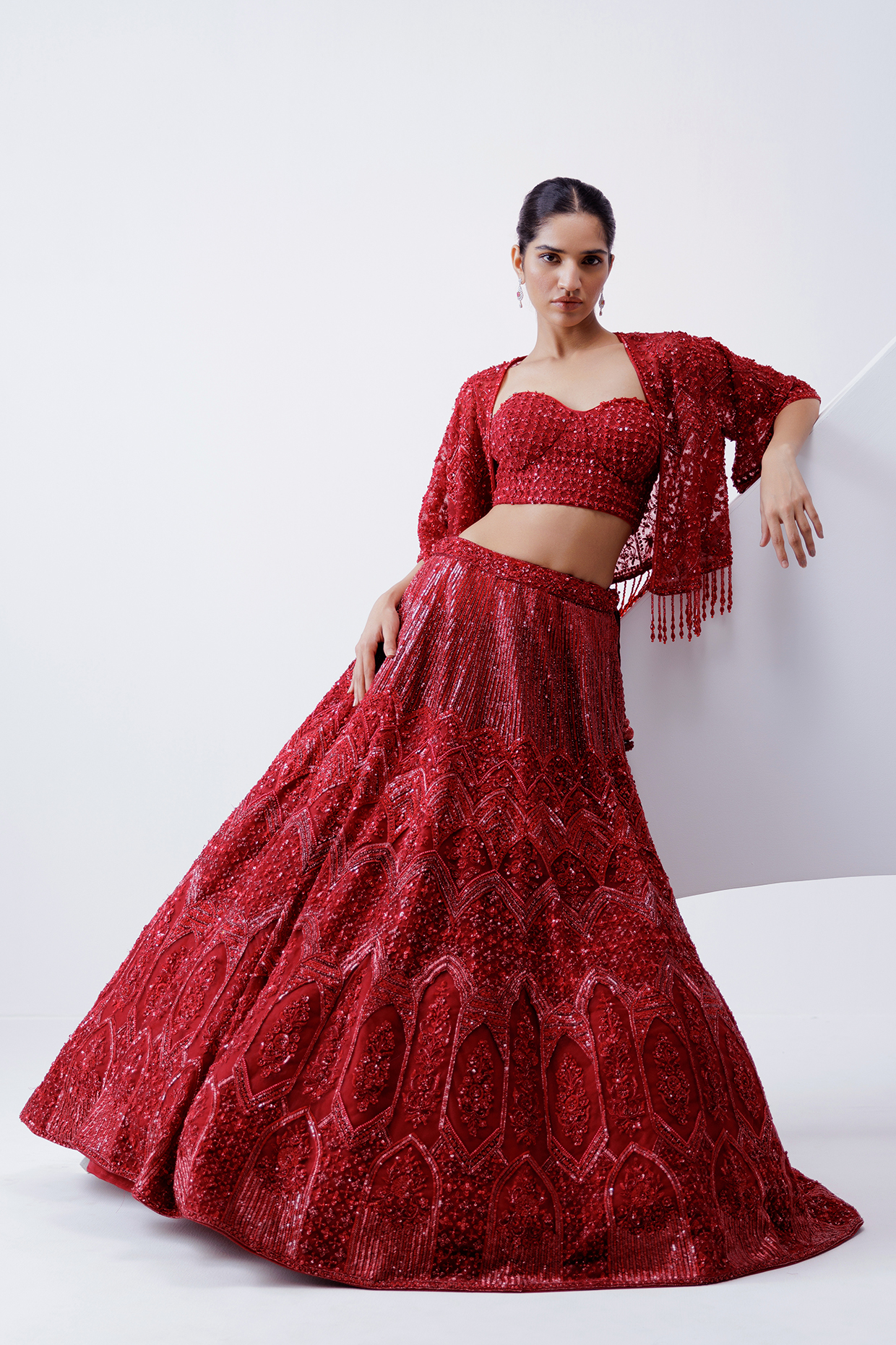 Red Net Sequin & Cutdana Embroidered Jacket Bridal Lehenga Set by ISTYA at Pernia's Pop Up Shop