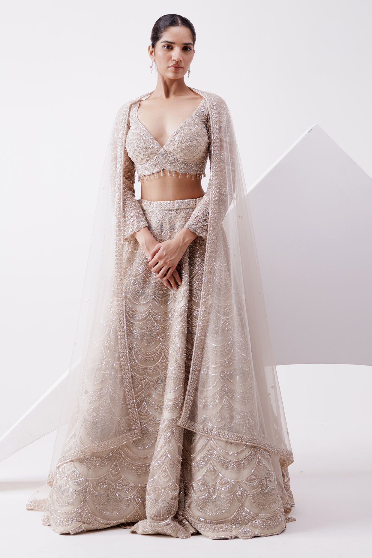 Beige Net Sequin & Cutdana Embroidered Wedding Lehenga Set by ISTYA at Pernia's Pop Up Shop