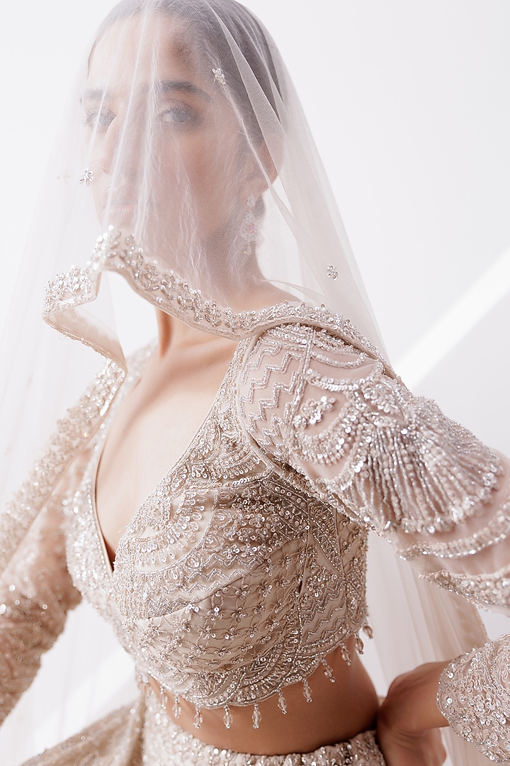 Beige Net Sequin & Cutdana Embroidered Wedding Lehenga Set by ISTYA at Pernia's Pop Up Shop