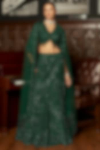 Emerald Green Net Sequins Embroidered Fish-Cut Bridal Lehenga Set by ISTYA at Pernia's Pop Up Shop