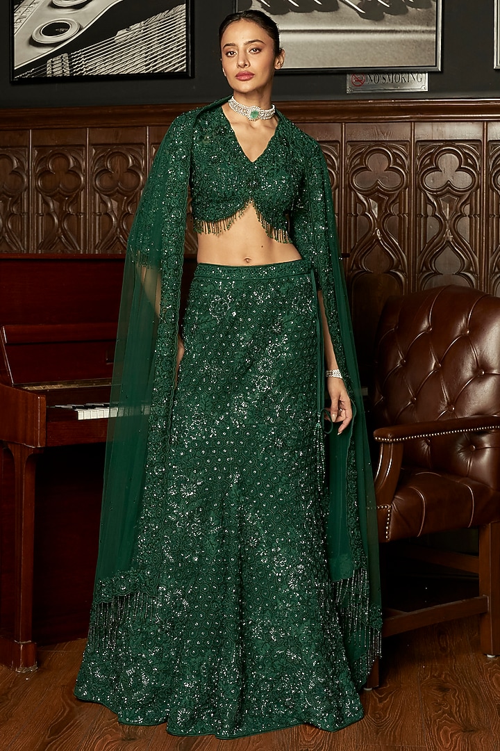 Emerald Green Net Sequins Embroidered Fish-Cut Bridal Lehenga Set by ISTYA at Pernia's Pop Up Shop