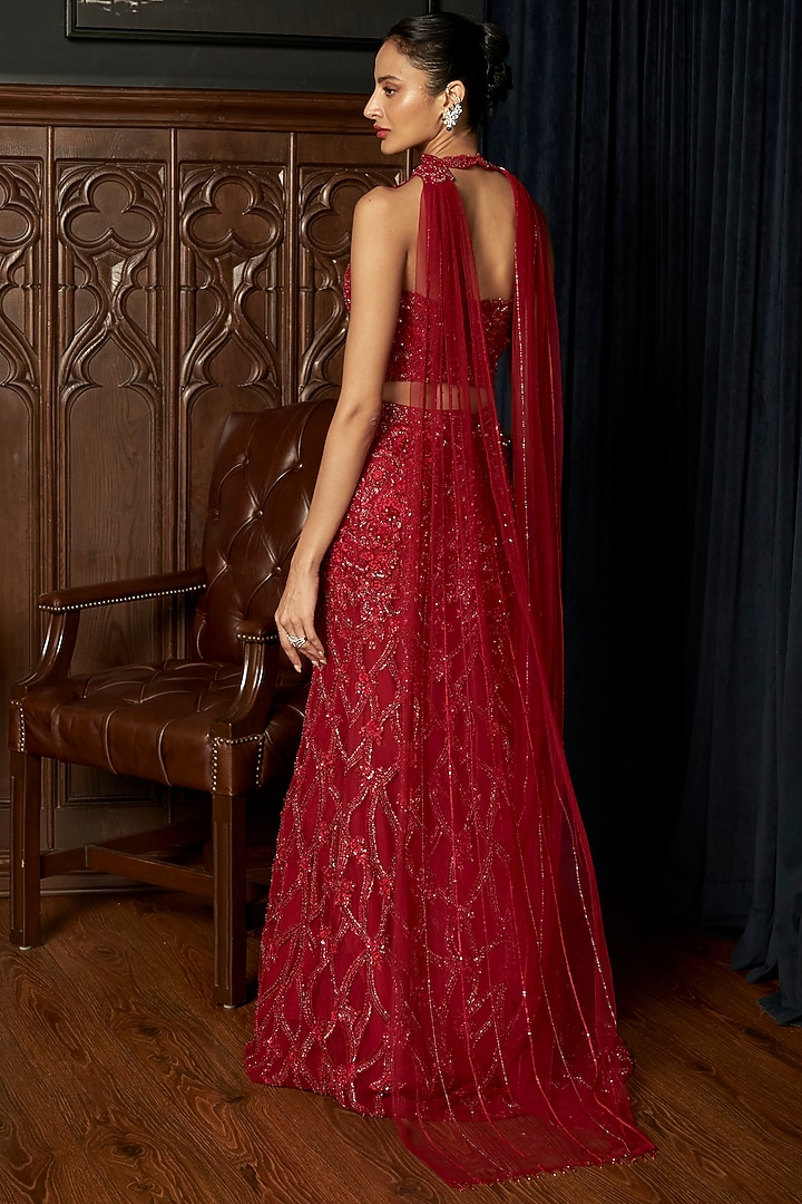 Red Net Sequins Embroidered Fish-Cut Wedding Lehenga Set by ISTYA at Pernia's Pop Up Shop
