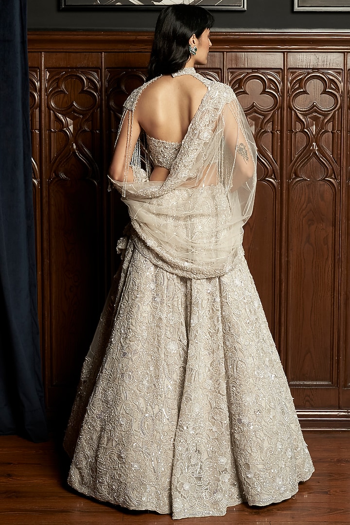 Grey Net Sequins Embroidered Bridal Lehenga Set by ISTYA at Pernia's Pop Up Shop