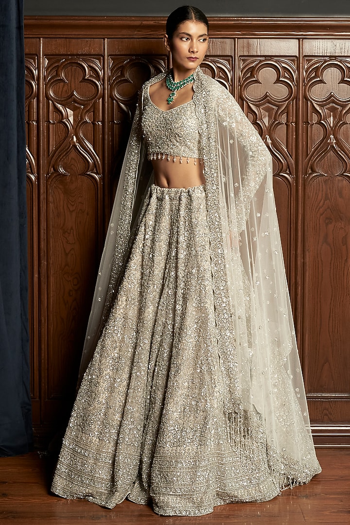 Grey Net Sequins Embroidered Bridal Lehenga Set by ISTYA at Pernia's Pop Up Shop