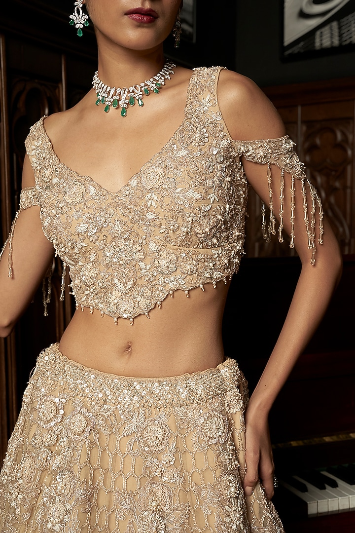Beige Net Hand Embellished Bridal Lehenga Set by ISTYA at Pernia's Pop Up Shop
