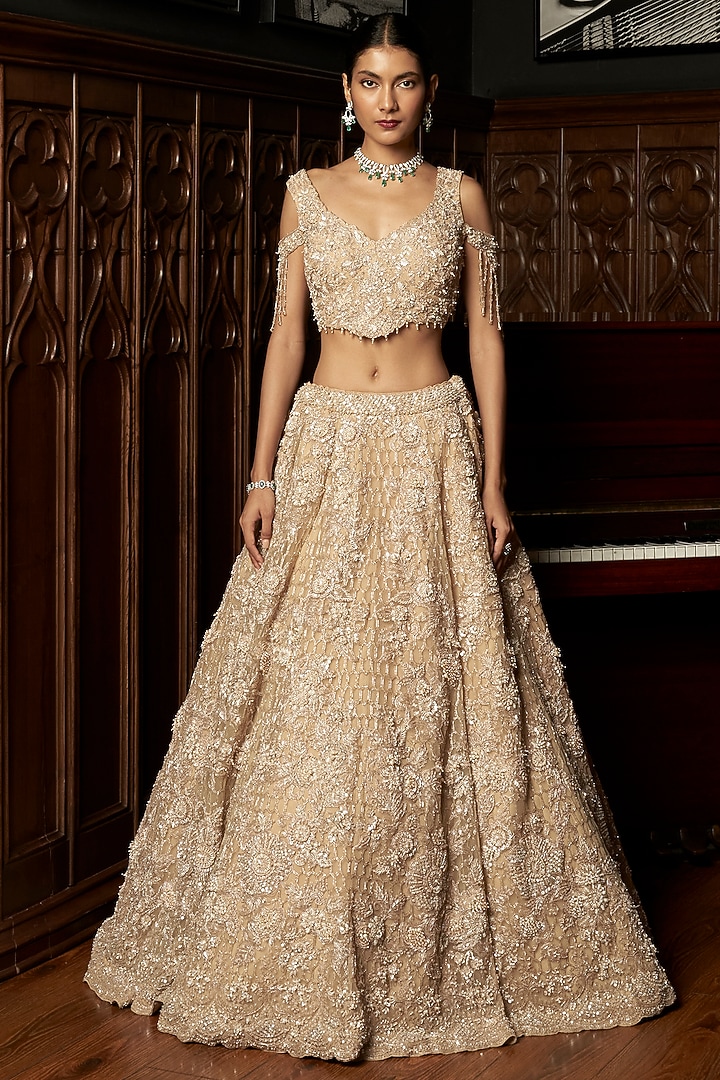 Beige Net Hand Embellished Bridal Lehenga Set by ISTYA at Pernia's Pop Up Shop