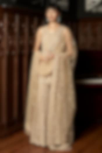 Beige Net Sequins Embroidered Bridal Sharara Set by ISTYA at Pernia's Pop Up Shop