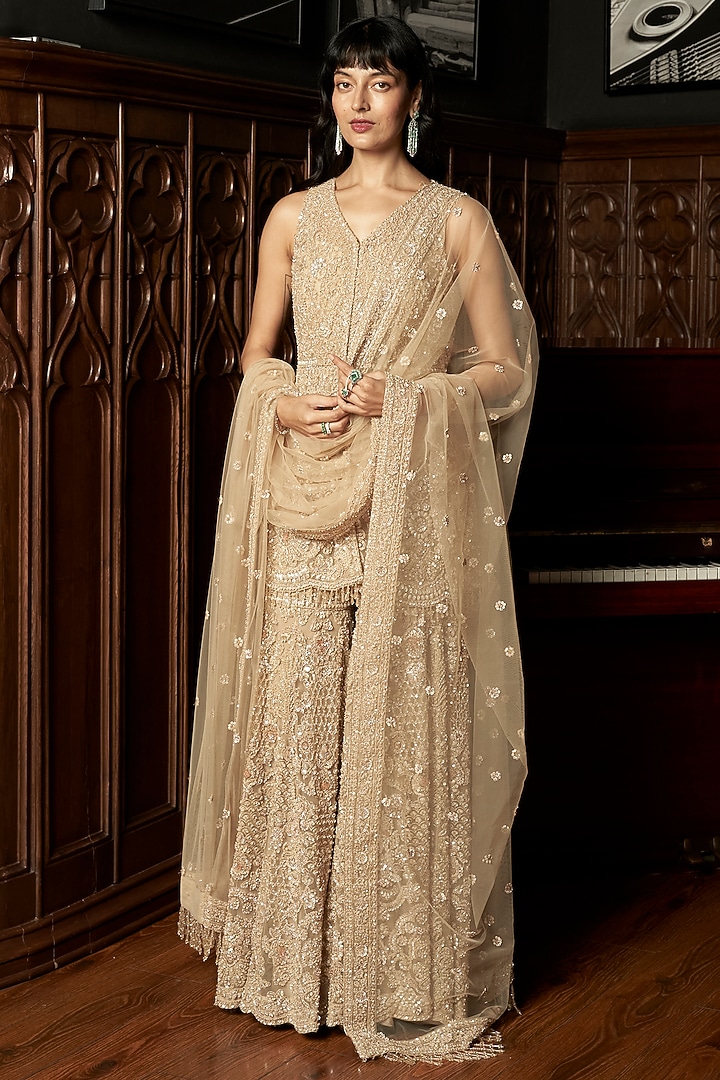 Beige Net Sequins Embroidered Bridal Sharara Set by ISTYA at Pernia's Pop Up Shop