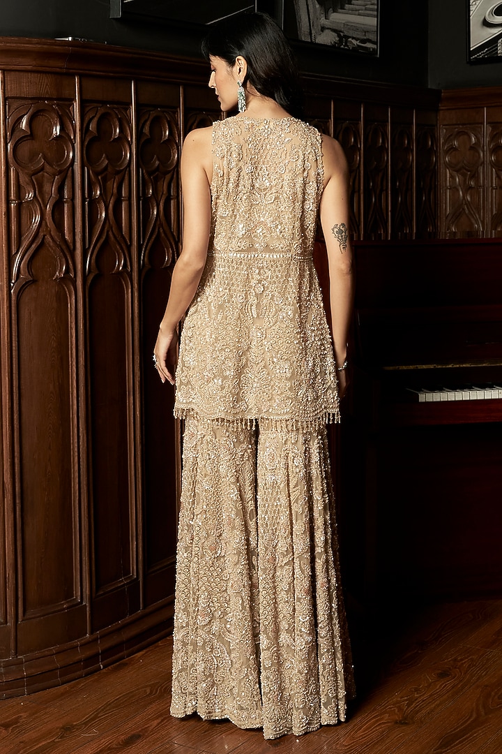 Beige Net Sequins Embroidered Bridal Sharara Set by ISTYA at Pernia's Pop Up Shop