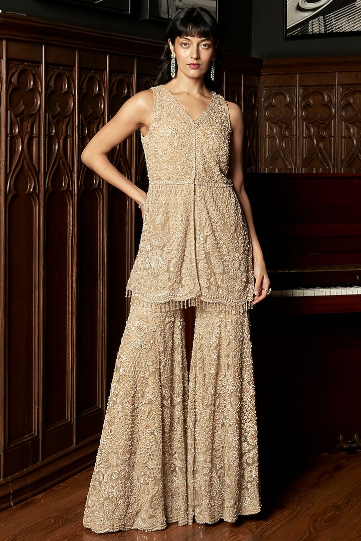 Beige Net Sequins Embroidered Bridal Sharara Set by ISTYA at Pernia's Pop Up Shop