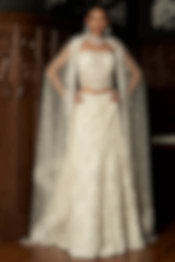 Ivory Net Hand Embroidered Bridal Lehenga Set by ISTYA at Pernia's Pop Up Shop