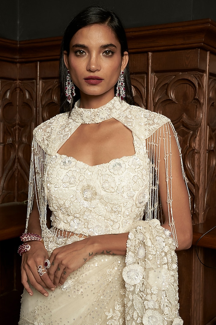 Ivory Net Applique Embroidered Jacket Reception Saree Set by ISTYA at Pernia's Pop Up Shop