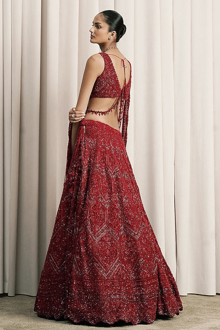 Red Net Floral & Crystal Embroidered Bridal Lehenga Set by ISTYA at Pernia's Pop Up Shop