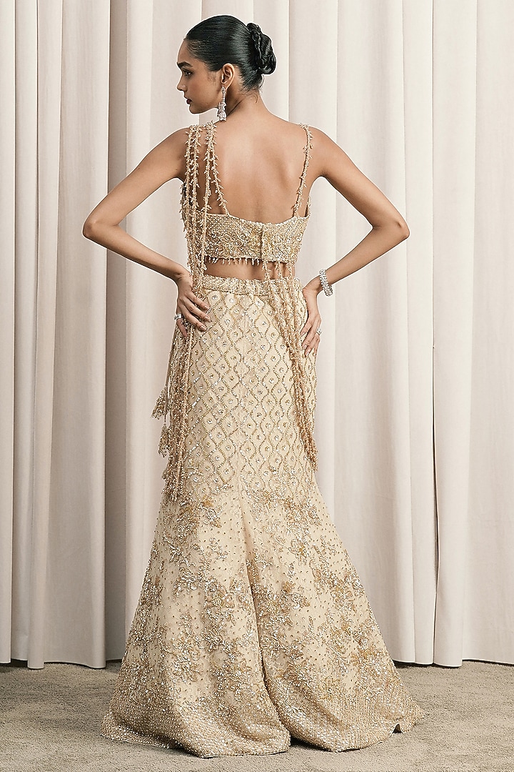 Beige Net Sequin Hand Embroidered Fish-Cut Bridal Lehenga Set by ISTYA at Pernia's Pop Up Shop