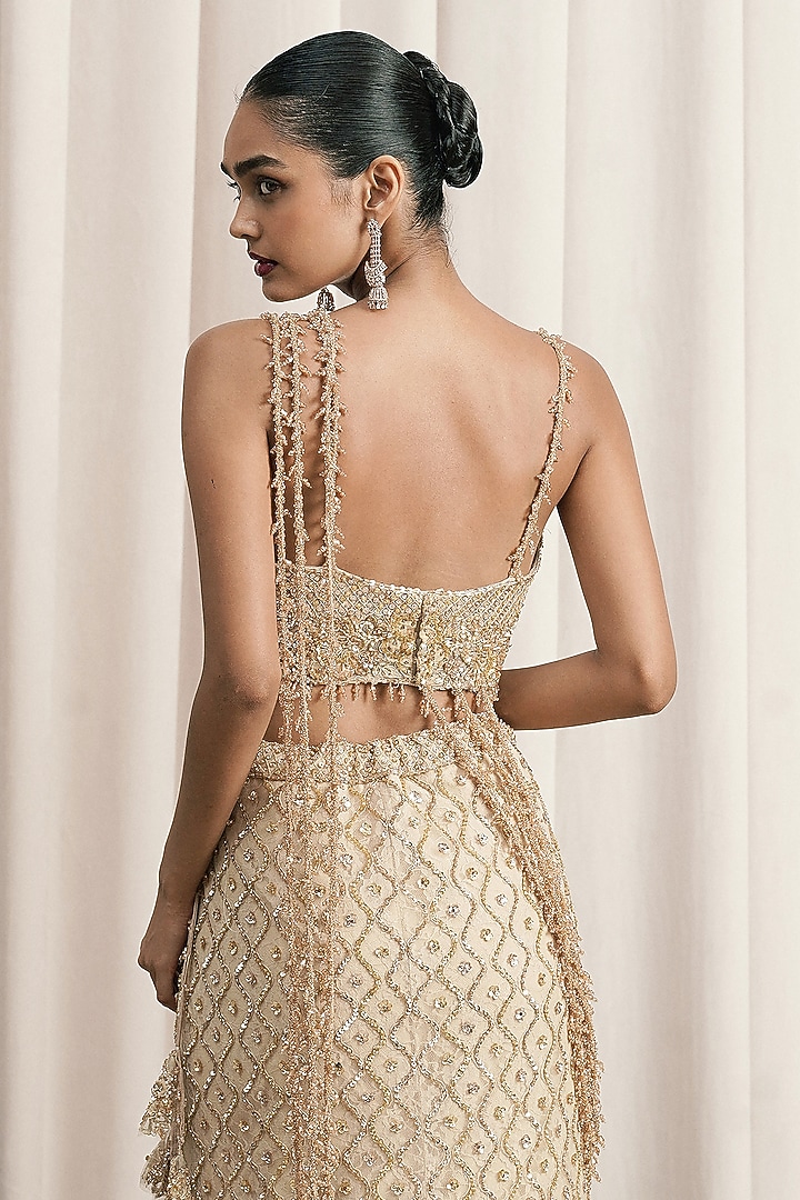 Beige Net Sequin Hand Embroidered Fish-Cut Bridal Lehenga Set by ISTYA at Pernia's Pop Up Shop