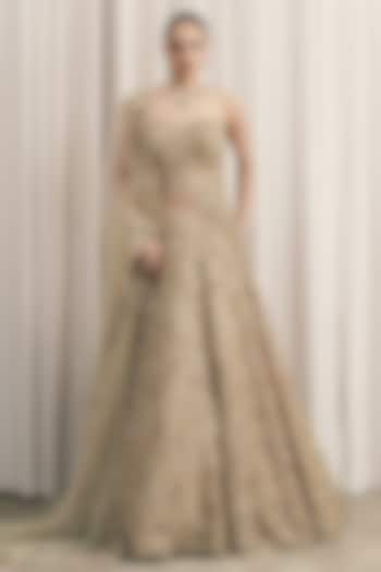 Beige Net Cutdana Hand Embroidered Fish-Cut Bridal Lehenga Set by ISTYA at Pernia's Pop Up Shop